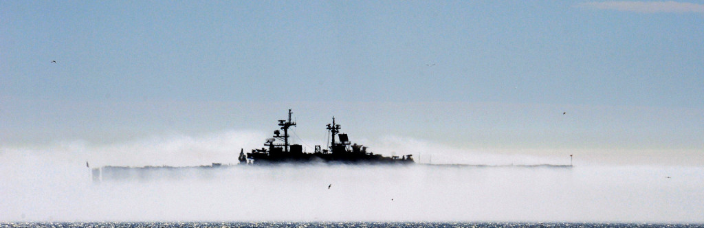 A ship is partially obscured by a fog bank off the coast of Naval Amphibious Base Coronado. U.S. Navy photo