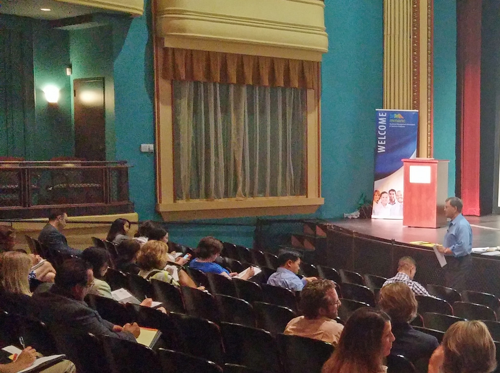 Frank Benest speaks at the 2015 Summer Signature Symposium, hosted by the City of Tracy at the Grand Theatre for the Arts